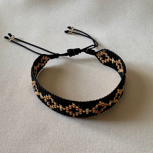 PULSERA NEGRO, DORADO Y COBRE