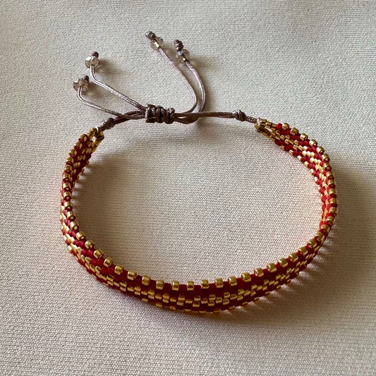 PULSERA ROJO CON DORADO